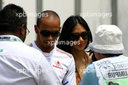 Lewis Hamilton (GBR), McLaren Mercedes and his girlfriend Nicole Scherzinger (USA) 25.03.2012. Formula 1 World Championship, Rd 2, Malaysian Grand Prix, Sepang, Malaysia, Sunday