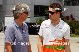 (L to R): Damon Hill (GBR) Sky Sports Presenter with Paul di Resta (GBR) Sahara Force India F1. 25.03.2012. Formula 1 World Championship, Rd 2, Malaysian Grand Prix, Sepang, Malaysia, Sunday