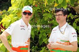 (L to R): Nico Hulkenberg (GER) Sahara Force India F1 with Bradley Joyce (GBR) Sahara Force India F1 Race Engineer. 25.03.2012. Formula 1 World Championship, Rd 2, Malaysian Grand Prix, Sepang, Malaysia, Sunday