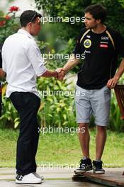 (L to R): Will Buxton (GBR) Speed TV Presenter with Jerome d'Ambrosio (BEL) Lotus Third Driver. 22.03.2012. Formula 1 World Championship, Rd 2, Malaysian Grand Prix, Sepang, Malaysia, Thursday
