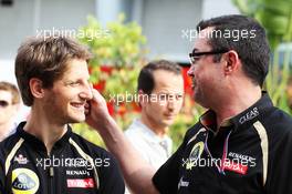 (L to R): Romain Grosjean (FRA) Lotus F1 Team with Eric Boullier (FRA) Lotus F1 Team Principal. 22.03.2012. Formula 1 World Championship, Rd 2, Malaysian Grand Prix, Sepang, Malaysia, Thursday