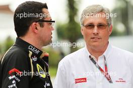 (L to R): Eric Boullier (FRA) Lotus F1 Team Principal with Gilles Buannic (FRA) Total Global Travel Manager. 22.03.2012. Formula 1 World Championship, Rd 2, Malaysian Grand Prix, Sepang, Malaysia, Thursday