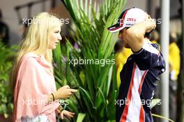 Bruno Senna (BRA) Williams with his girlfriend Charlotte Evans (GBR). 21.09.2012.Formula 1 World Championship, Rd 14, Singapore Grand Prix, Singapore, Singapore, Practice Day
