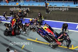 Sebastian Vettel (GER) Red Bull Racing RB8 and Mark Webber (AUS) Red Bull Racing RB8 pushed back in the pits. 21.09.2012.Formula 1 World Championship, Rd 14, Singapore Grand Prix, Singapore, Singapore, Practice Day