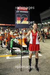 Grid girl for Nico Hulkenberg (GER) Sahara Force India F1 VJM05. 23.09.2012. Formula 1 World Championship, Rd 14, Singapore Grand Prix, Singapore, Singapore, Race Day