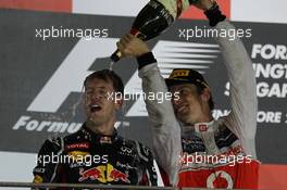 1st place Sebastian Vettel (GER), Red Bull Racing with 2nd place Jenson Button (GBR), McLaren Mercedes  23.09.2012. Formula 1 World Championship, Rd 14, Singapore Grand Prix, Singapore, Singapore, Race Day