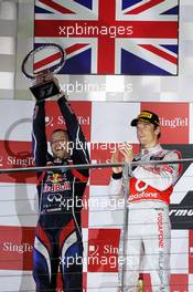 Ole Schack (DEN) Red Bull Racing Mechanic celebrates on the podium. 23.09.2012. Formula 1 World Championship, Rd 14, Singapore Grand Prix, Singapore, Singapore, Race Day
