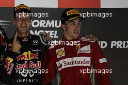 1st place Sebastian Vettel (GER), Red Bull Racing with 3rd place Fernando Alonso (ESP), Scuderia Ferrari  23.09.2012. Formula 1 World Championship, Rd 14, Singapore Grand Prix, Singapore, Singapore, Race Day
