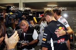 Jenson Button (GBR) McLaren and Sebastian Vettel (GER) Red Bull Racing leave the Stewards office after the race. 23.09.2012. Formula 1 World Championship, Rd 14, Singapore Grand Prix, Singapore, Singapore, Race Day