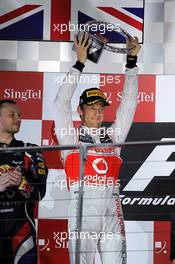 Jenson Button (GBR) McLaren celebrates his second position on the podium. 23.09.2012. Formula 1 World Championship, Rd 14, Singapore Grand Prix, Singapore, Singapore, Race Day