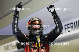 Race winner Sebastian Vettel (GER) Red Bull Racing celebrates in parc ferme. 23.09.2012. Formula 1 World Championship, Rd 14, Singapore Grand Prix, Singapore, Singapore, Race Day