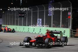 Timo Glock (GER) Marussia F1 Team MR01 leads team mate Charles Pic (FRA) Marussia F1 Team MR01. 23.09.2012. Formula 1 World Championship, Rd 14, Singapore Grand Prix, Singapore, Singapore, Race Day