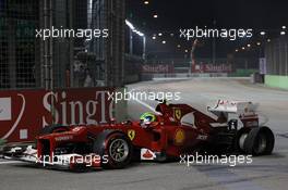 Felipe Massa (BRA) Ferrari F2012 with punctured rear tyre at the start of the race. 23.09.2012. Formula 1 World Championship, Rd 14, Singapore Grand Prix, Singapore, Singapore, Race Day