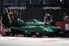 The Caterham CT01 of Vitaly Petrov (RUS) Caterham is recovered to the pits after he crashed in the third practice session. 22.09.2012. Formula 1 World Championship, Rd 14, Singapore Grand Prix, Singapore, Singapore, Qualifying Day