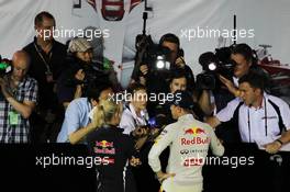 Sebastian Vettel (GER) Red Bull Racing with the media. 22.09.2012. Formula 1 World Championship, Rd 14, Singapore Grand Prix, Singapore, Singapore, Qualifying Day