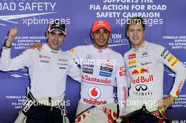 Lewis Hamilton (GBR), McLaren Mercedes gets pole postion with 2nd place Pastor Maldonado (VEN), Williams F1 Team and 3rd Sebastian Vettel (GER), Red Bull Racing  22.09.2012. Formula 1 World Championship, Rd 14, Singapore Grand Prix, Singapore, Singapore, Qualifying Day