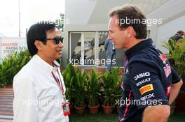 (L to R): Chalerm Yoovidhya (THA) Red Bull Racing Co-Owner with Christian Horner (GBR) Red Bull Racing Team Principal. 22.09.2012. Formula 1 World Championship, Rd 14, Singapore Grand Prix, Singapore, Singapore, Qualifying Day
