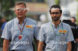 Mario Isola (ITA) Pirelli Racing Manager (Left). 20.09.2012. Formula 1 World Championship, Rd 14, Singapore Grand Prix, Singapore, Singapore, Preparation Day