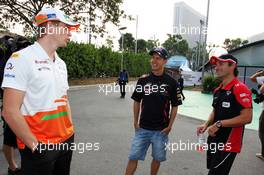 (L to R): Nico Hulkenberg (GER) Sahara Force India F1 with Sebastian Vettel (GER) Red Bull Racing and Timo Glock (GER) Marussia F1 Team. 20.09.2012. Formula 1 World Championship, Rd 14, Singapore Grand Prix, Singapore, Singapore, Preparation Day