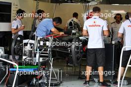 McLaren MP4/27 checked by an FIA Delegate. 20.09.2012. Formula 1 World Championship, Rd 14, Singapore Grand Prix, Singapore, Singapore, Preparation Day
