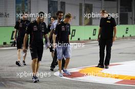 Sebastian Vettel (GER) Red Bull Racing walks the circuit with Guillaume Rocquelin  (ITA) Red Bull Racing Race Engineer. 20.09.2012. Formula 1 World Championship, Rd 14, Singapore Grand Prix, Singapore, Singapore, Preparation Day
