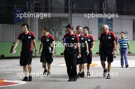 Marc Hynes (GBR) Marussia F1 Team Driver Coach (Left) walks the circuit with Graeme Lowdon (GBR) Marussia F1 Team Chief Executive Officer. 20.09.2012. Formula 1 World Championship, Rd 14, Singapore Grand Prix, Singapore, Singapore, Preparation Day