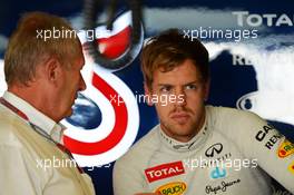 (L to R): Dr Helmut Marko (AUT) Red Bull Motorsport Consultant with Sebastian Vettel (GER) Red Bull Racing. 02.11.2012. Formula 1 World Championship, Rd 18, Abu Dhabi Grand Prix, Yas Marina Circuit, Abu Dhabi, Practice Day.