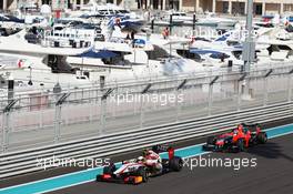 Ma Qing Hua (CHN) Hispania Racing F1 Team (HRT) F112 Test Driver leads Max Chilton (GBR) Marussia F1 Team MR01 Reserve Driver. 02.11.2012. Formula 1 World Championship, Rd 18, Abu Dhabi Grand Prix, Yas Marina Circuit, Abu Dhabi, Practice Day.