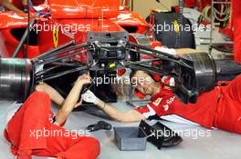 Ferrari F2012 is worked on in the pits. 02.11.2012. Formula 1 World Championship, Rd 18, Abu Dhabi Grand Prix, Yas Marina Circuit, Abu Dhabi, Practice Day.