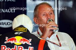 Dr Helmut Marko (AUT) Red Bull Motorsport Consultant enjoys a Red Bull. 02.11.2012. Formula 1 World Championship, Rd 18, Abu Dhabi Grand Prix, Yas Marina Circuit, Abu Dhabi, Practice Day.
