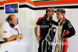  Marc Hynes (GBR) Marussia F1 Team Driver Coach with Max Chilton (GBR) Marussia F1 Team MR01 Test Driver and father Grahame Chilton (GBR). 02.11.2012. Formula 1 World Championship, Rd 18, Abu Dhabi Grand Prix, Yas Marina Circuit, Abu Dhabi, Practice Day.