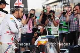 Lewis Hamilton (GBR) McLaren MP4/27 on the grid. 04.11.2012. Formula 1 World Championship, Rd 18, Abu Dhabi Grand Prix, Yas Marina Circuit, Abu Dhabi, Race Day.