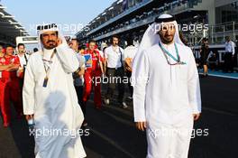 Mohammed Bin Sulayem (UAE) (Left) on the grid. 04.11.2012. Formula 1 World Championship, Rd 18, Abu Dhabi Grand Prix, Yas Marina Circuit, Abu Dhabi, Race Day.