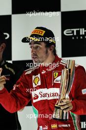 Fernando Alonso (ESP) Ferrari celebrates his second position on the podium. 04.11.2012. Formula 1 World Championship, Rd 18, Abu Dhabi Grand Prix, Yas Marina Circuit, Abu Dhabi, Race Day.