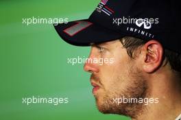 Third placed Sebastian Vettel (GER) Red Bull Racing in the FIA Press Conference. 04.11.2012. Formula 1 World Championship, Rd 18, Abu Dhabi Grand Prix, Yas Marina Circuit, Abu Dhabi, Race Day.