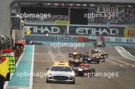 Lewis Hamilton (GBR) McLaren MP4/27 leads behind the Safety Car. 04.11.2012. Formula 1 World Championship, Rd 18, Abu Dhabi Grand Prix, Yas Marina Circuit, Abu Dhabi, Race Day.