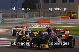Daniel Ricciardo (AUS) Scuderia Toro Rosso STR7 leads Sebastian Vettel (GER) Red Bull Racing RB8. 04.11.2012. Formula 1 World Championship, Rd 18, Abu Dhabi Grand Prix, Yas Marina Circuit, Abu Dhabi, Race Day.