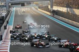 A crash at the start of the race involving Paul di Resta (GBR) Sahara Force India VJM05; Nico Hulkenberg (GER) Sahara Force India F1 VJM05; Bruno Senna (BRA) Williams; Romain Grosjean (FRA) Lotus F1 E20 and Sergio Perez (MEX) Sauber C31. 04.11.2012. Formula 1 World Championship, Rd 18, Abu Dhabi Grand Prix, Yas Marina Circuit, Abu Dhabi, Race Day.