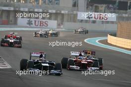 Fernando Alonso (ESP), Scuderia Ferrari and Mark Webber (AUS), Red Bull Racing  04.11.2012. Formula 1 World Championship, Rd 18, Abu Dhabi Grand Prix, Abu Dhabi, UAE, Race Day