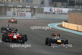 Sebastian Vettel (GER), Red Bull Racing and Timo Glock (GER), Marussia F1 Team  04.11.2012. Formula 1 World Championship, Rd 18, Abu Dhabi Grand Prix, Abu Dhabi, UAE, Race Day
