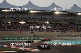 Fernando Alonso (ESP) Ferrari F2012 leads Mark Webber (AUS) Red Bull Racing RB8 and Jenson Button (GBR) McLaren MP4/27. 04.11.2012. Formula 1 World Championship, Rd 18, Abu Dhabi Grand Prix, Yas Marina Circuit, Abu Dhabi, Race Day.