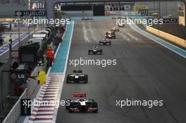 Lewis Hamilton (GBR) McLaren MP4/27 leads at the start of lap two. 04.11.2012. Formula 1 World Championship, Rd 18, Abu Dhabi Grand Prix, Yas Marina Circuit, Abu Dhabi, Race Day.