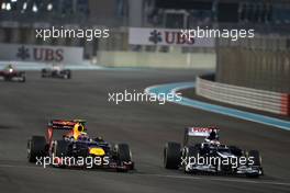 Mark Webber (AUS), Red Bull Racing and Pastor Maldonado (VEN), Williams F1 Team  04.11.2012. Formula 1 World Championship, Rd 18, Abu Dhabi Grand Prix, Abu Dhabi, UAE, Race Day