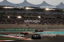 Pastor Maldonado (VEN) Williams FW34 leads Fernando Alonso (ESP) Ferrari F2012 and Mark Webber (AUS) Red Bull Racing RB8. 04.11.2012. Formula 1 World Championship, Rd 18, Abu Dhabi Grand Prix, Yas Marina Circuit, Abu Dhabi, Race Day.