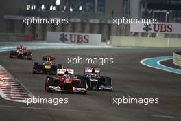 Fernando Alonso (ESP), Scuderia Ferrari and Pastor Maldonado (VEN), Williams F1 Team  04.11.2012. Formula 1 World Championship, Rd 18, Abu Dhabi Grand Prix, Abu Dhabi, UAE, Race Day