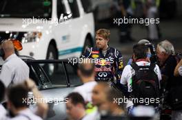 Sebastian Vettel (GER) Red Bull Racing returns to parc ferme in the FIA Medical Car after stopping on the track at the end of qualifying.  03.11.2012. Formula 1 World Championship, Rd 18, Abu Dhabi Grand Prix, Yas Marina Circuit, Abu Dhabi, Qualifying Day.