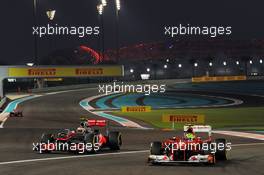 Felipe Massa (BRA) Ferrari F2012 and Lewis Hamilton (GBR) McLaren MP4/27. 03.11.2012. Formula 1 World Championship, Rd 18, Abu Dhabi Grand Prix, Yas Marina Circuit, Abu Dhabi, Qualifying Day.