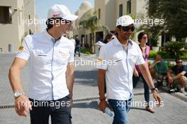 (L to R): Pedro De La Rosa (ESP) HRT Formula 1 Team with team mate Narain Karthikeyan (IND) Hispania Racing F1 Team (HRT). 03.11.2012. Formula 1 World Championship, Rd 18, Abu Dhabi Grand Prix, Yas Marina Circuit, Abu Dhabi, Qualifying Day.