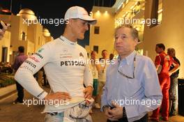 (L to R): Michael Schumacher (GER) Mercedes AMG F1 with Jean Todt (FRA) FIA President. 03.11.2012. Formula 1 World Championship, Rd 18, Abu Dhabi Grand Prix, Yas Marina Circuit, Abu Dhabi, Qualifying Day.