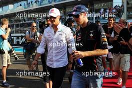 (L to R): Michael Schumacher (GER) Mercedes AMG F1 and Sebastian Vettel (GER) Red Bull Racing on the drivers parade. 04.11.2012. Formula 1 World Championship, Rd 18, Abu Dhabi Grand Prix, Yas Marina Circuit, Abu Dhabi, Race Day.